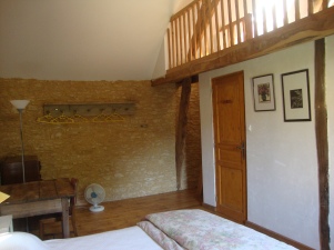 The mezzanine level in the second double bedroom is reached by a ladder.